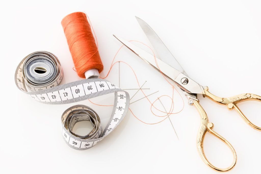 tape measure, scissors, fabric scissors