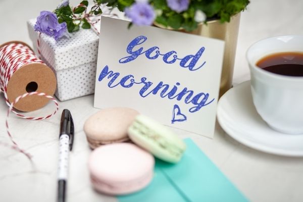 Good morning note with coffee and macarons